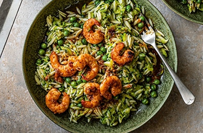 ’Nduja prawns with courgette & pea pasta