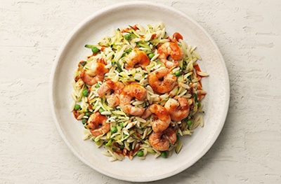 'Nduja prawns with courgette & orzo