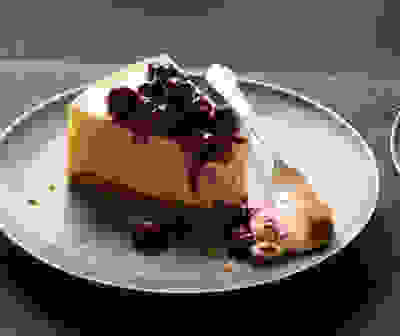 New York-style yogurt cheesecake with blueberry compote