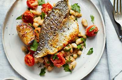 Pan-fried sea bream with cannellini beans and tomatoes