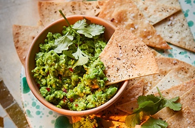 Pea ‘guacamole’ with homemade tortilla chips