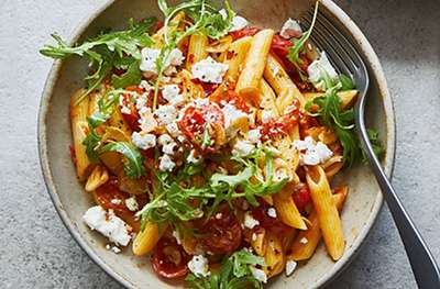 Penne with buttery vine tomatoes, rocket & feta