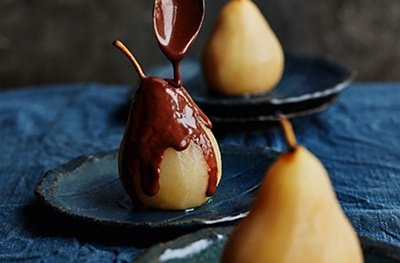 Poached pears with hot chocolate sauce