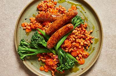 Ricotta & pepper spelt with spicy ’nduja sausages and Tenderstem
