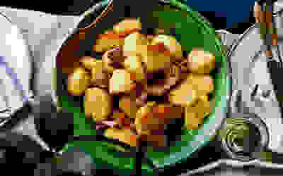 Roast potatoes with confit garlic