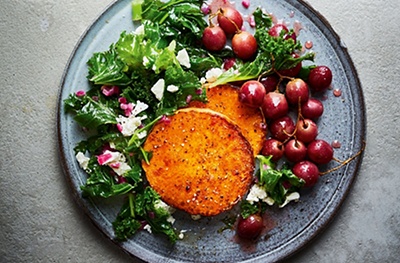 Roasted butternut with wilted kale, feta & honeyed grapes