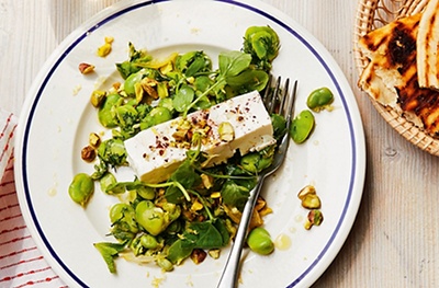Roasted feta with crushed broad beans, dill & preserved lemon