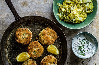 Salmon fish cakes with pointed cabbage & chive soured cream