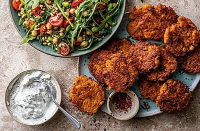 Spicy carrot fritters with tomato grain salad & tzatziki 