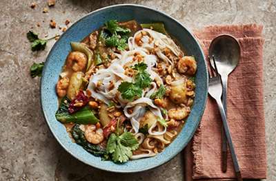 Spicy seafood massaman noodle bowl