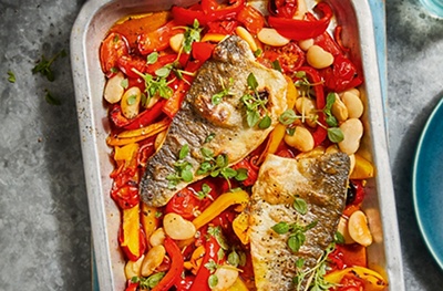 Spicy soy-dressed sea bass with peppers & Greek basil