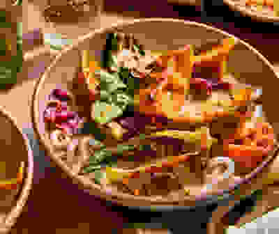 Spicy gyoza laksa-style soup