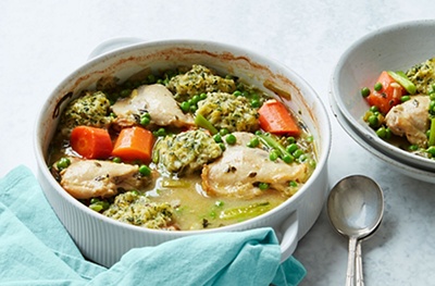 Spring chicken stew with peas and herbed dumplings