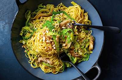Stir-fried cabbage and mushrooms with noodles