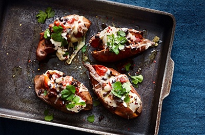 Sweet potato jackets with gruyere and black beans