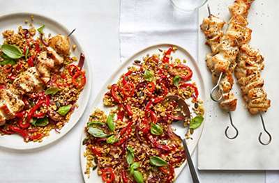 Sweet & sour freekeh with chicken skewers