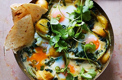 Thai-inspired green curried baked eggs with spinach & potato