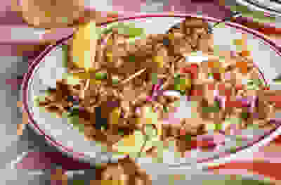 Tikka chicken skewers with tomato salad, rice & yogurt 