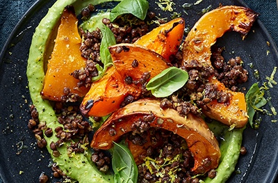 Roasted squash and lentils with green goddess avocado sauce