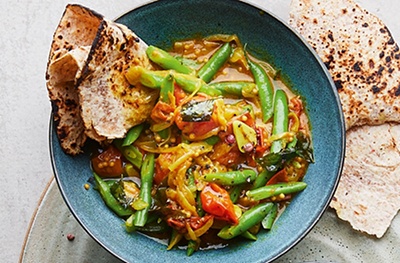 Tomato & green bean curry with flatbreads 