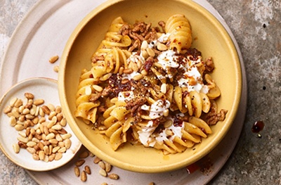 Turkish-style lamb pasta with pine nuts & harissa butter