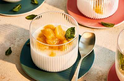 Vanilla panna cotta with peach & amaretto compote 