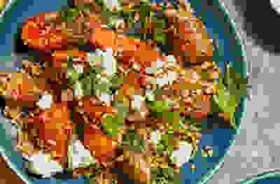 Warm bulgur, veggie sausage & harissa roasted carrot salad