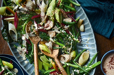 Warm winter green salad with tahini dressing